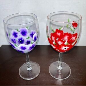 Two beautiful hand painted wine glasses. Violets and Poppies.